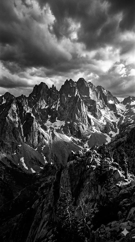 A storm breaking over a granite massif
